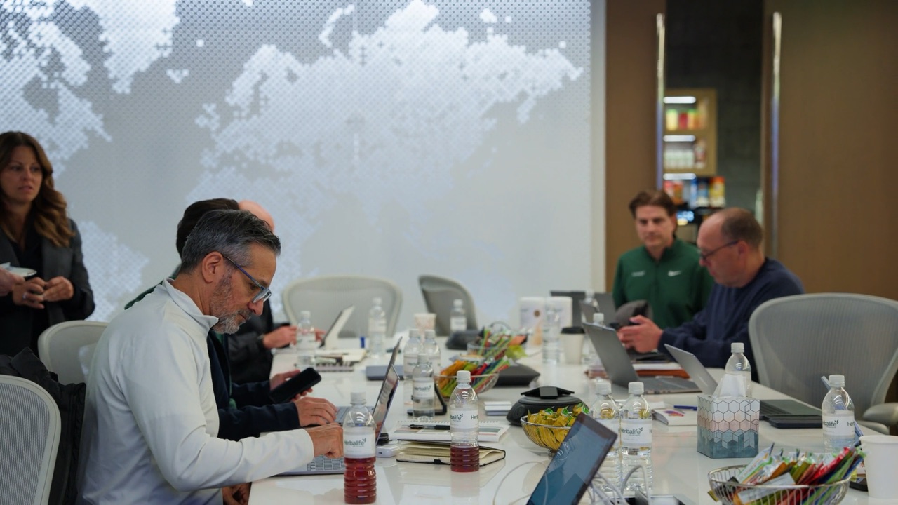 Leadership team working together around a conference table