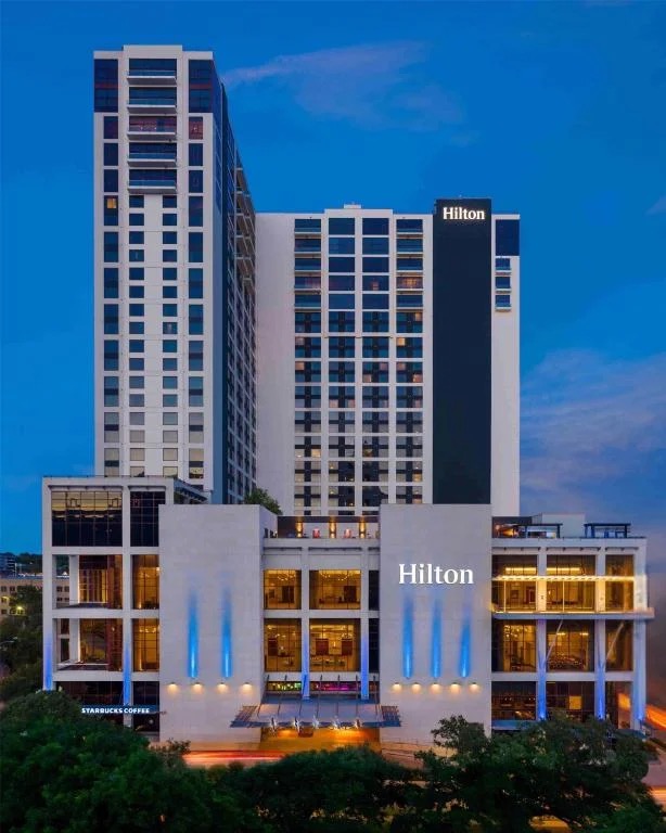 Hilton Austin at dusk, the Team Accelerator venue