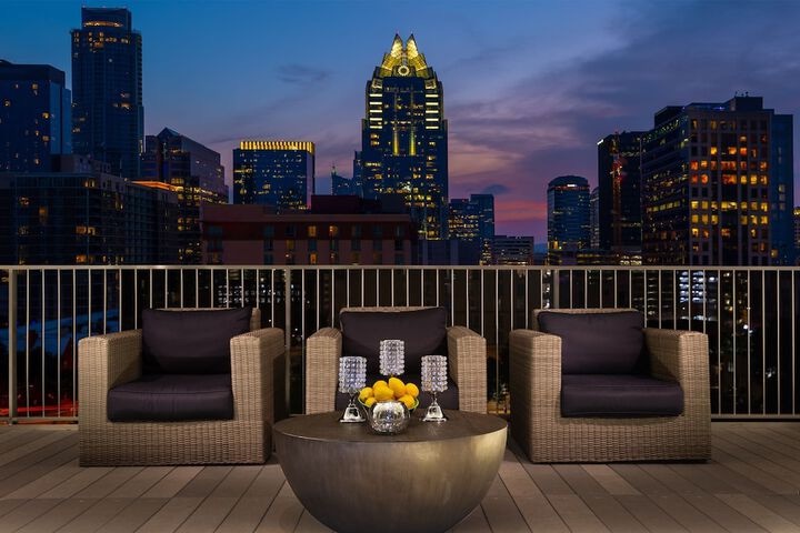 Hilton Austin rooftop terrace overlooking the city skyline